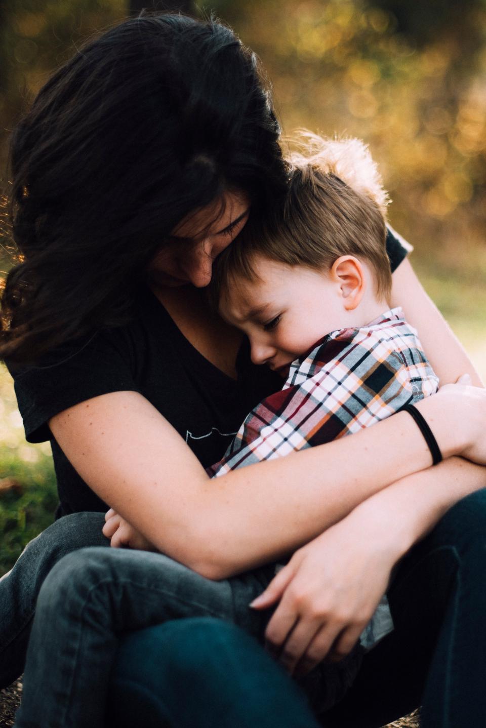 Parent supporting a child anxious about an upcoming move